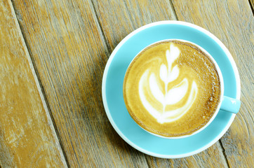 Cappuccino hot coffee blue cups on wooden backgrounds above, Top views