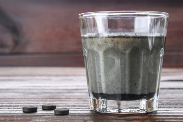 Coal latte. Black cappuccino. Black coffee with activated carbon.