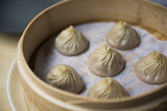Dumplings in bamboo steamer