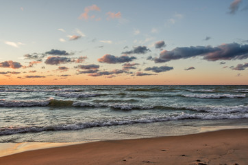 Fototapeta na wymiar Sunset on the Waves of Lake Michigan