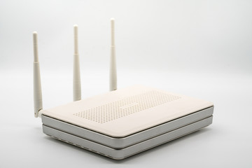 Wi-Fi wireless router with three antenna isolated on white