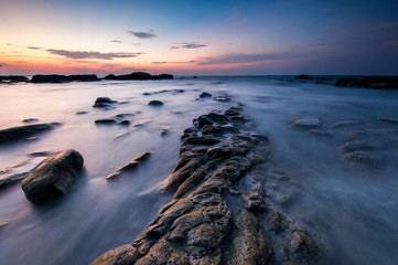 long expose blue hour sunset seascape at Kudat, SAbah Malaysia. image contain soft focus and blur due to long expose.