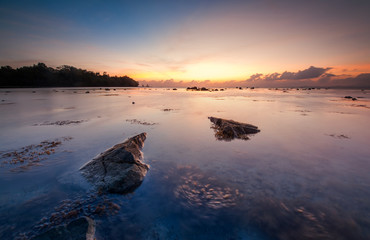 Sunrise seascape at Kudat, Sabah Malaysia. Image contain soft focus and blur due to long expose.