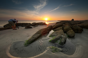 Sunset seascape with beautiful sky at Terongkongan Beach, Sabah Malaysia. image contain soft focus...