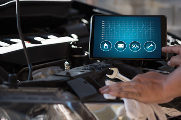 Mechanic repairing Car service concept. repair car engine