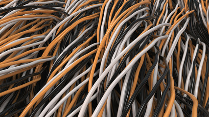Twisted black, white and orange cables and wires on black surface