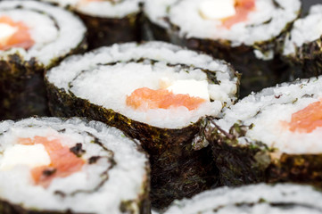Sushi rolls as food background. Close up.