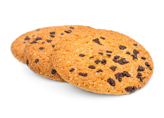 Pile of chocolate chip cookies on white background.