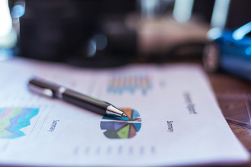 business chart and pen