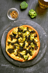 Pizza with broccoli and cheese