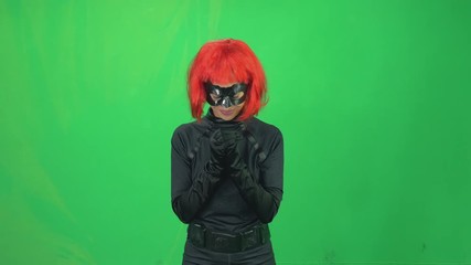 4k Kung Fu girl with red hair blows by hand outside in karate style martial arts - Powered by Adobe