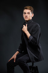 Fototapeta premium handsome young man in black jacket