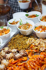 traditional vietnamese cusine at night food market in Ho Chi Minh City, Saigon, Vietnam