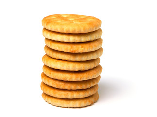 Biscuit cracker stack of yellow round isolated on white background