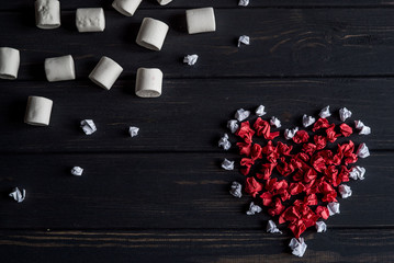 paper heart on a wooden table