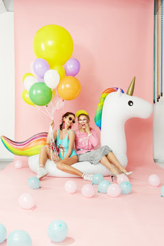 Summer Fun. Happy Women Friends In Fashion Clothes With Balloons
