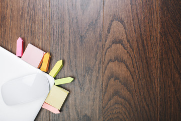 Wooden table with colorful supplies