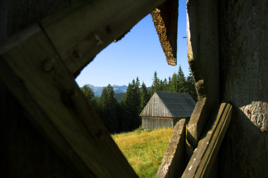 The view throufh the small wood window of the Hayloft situated under Tatra mountains
