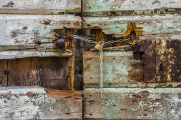  Locked colorful wooden door locked with rusty lock, Montenegro