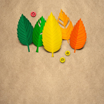 Happy Thanksgiving day / Creative thanksgiving day concept photo of leaves made of paper on brown background.