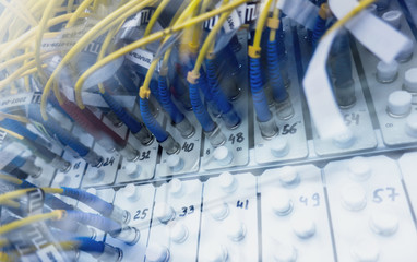 Fiber Optical connector interface. multiple exposure. Information Technology Computer Network, Telecommunication Fiber Optical Cables Connected. Data server.