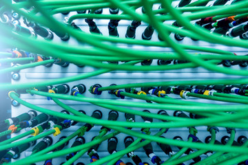 Acoustic audio cable server. Green audio cable. Many acoustic cables. Сoaxial cable for data...