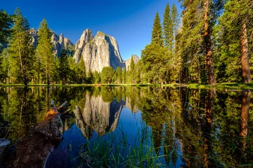  Middle Cathedral Rock reflecting in Merced River at Yosemite © haveseen