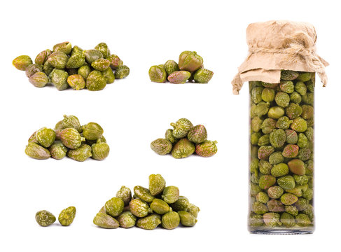 Collections of capers isolated on white background. Pickled capers. Canned capers