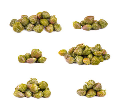 Collections of capers isolated on white background. Pickled capers. Canned capers