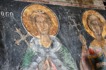 Obraz na płótnie Canvas Detailed view with frescoes from the byzantine church of Agios Antonios in Kokkinogi, Elassona, Greece.