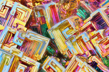 Amazing colorful rainbow Bismuth Gemstone Crystals macro closeup texture as background