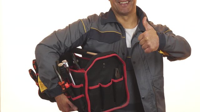 Cropped shot of a constructionist with toolbox showing thumbs up