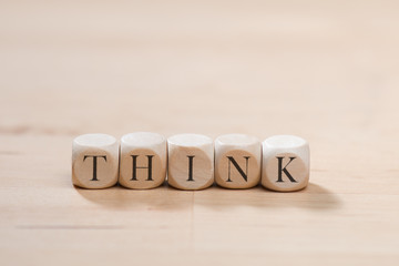Think word on wooden cubes. Think concept