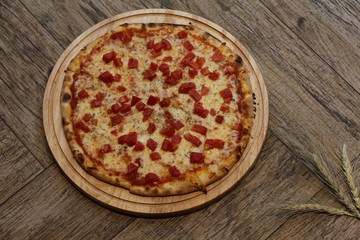 Tasty pizza with meat and vegetables