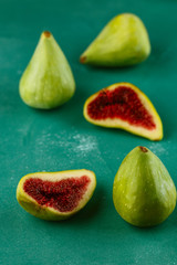 green figs on green background