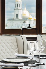 Luxury table set in restaurant, serving classic style dining room interior
