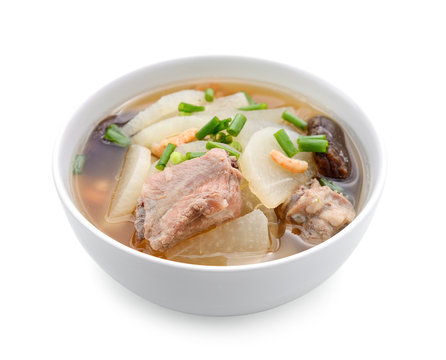 soup radish with pork serve on bowl, thai food isolated on white background
