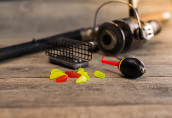 fishing tackle on a wooden table