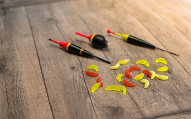 fishing tackle on a wooden table