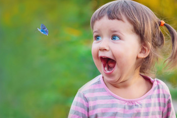 Little girl is surprised and happy
