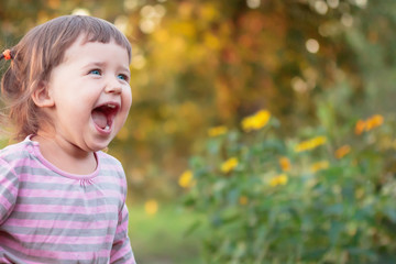 Little girl is surprised and happy