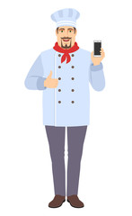 Chef with mobile phone showing thumb up