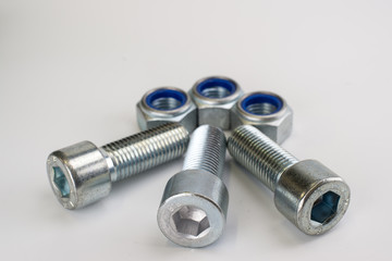 Hexagon Screws and nuts on white background