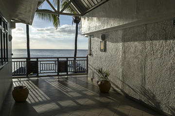 terrace with sunset rays overlooking the sea on Mauritius Island