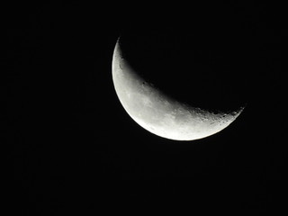Obraz na płótnie Canvas Closeup view of moon movement at night.