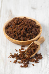 molasses sugar on wooden surface