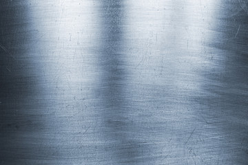 bright metal background, polished steel texture with scratches