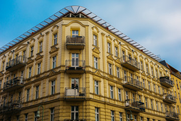Fototapeta na wymiar yellow big corner building in berlin