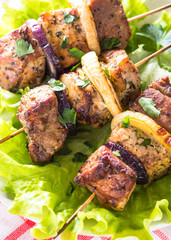 Grilled shish kebab or shashlik on white.