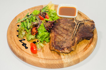 well-fried juicy steak with vegetables